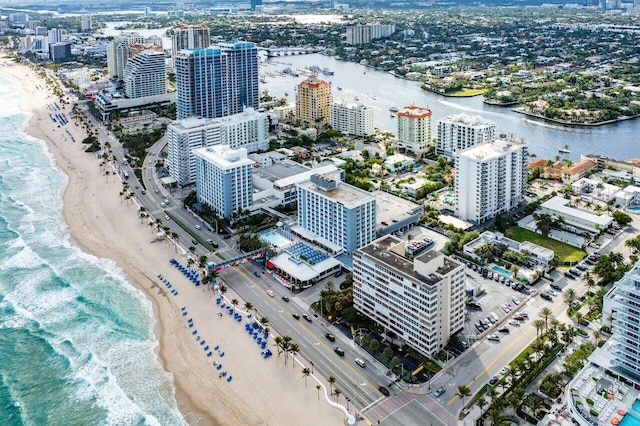 aerial view featuring a water view and a view of the beach