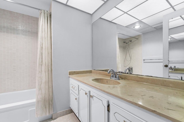 bathroom with tile patterned floors, vanity, and shower / tub combo with curtain