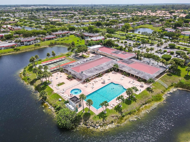 birds eye view of property featuring a water view