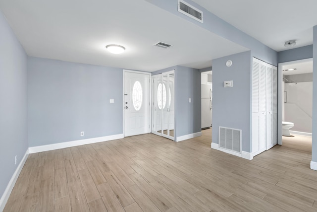 entryway with light wood-type flooring