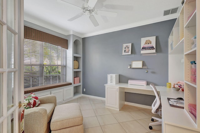 office space featuring crown molding, light tile patterned floors, and ceiling fan