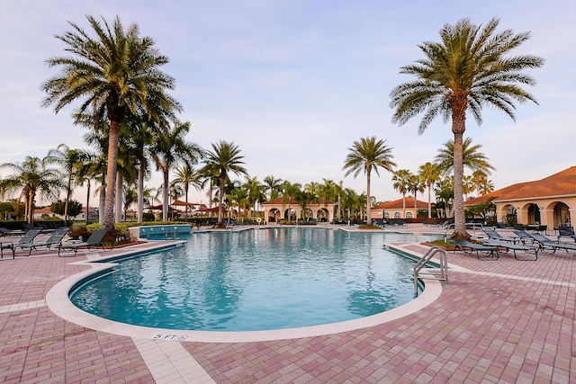 view of swimming pool featuring a patio