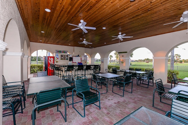 view of patio / terrace featuring ceiling fan and an outdoor living space