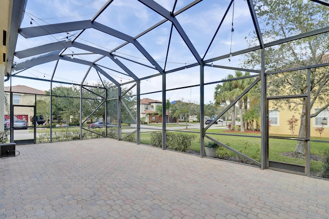 view of patio with a lanai