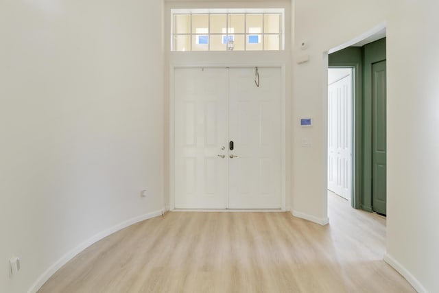 entrance foyer featuring light wood-type flooring