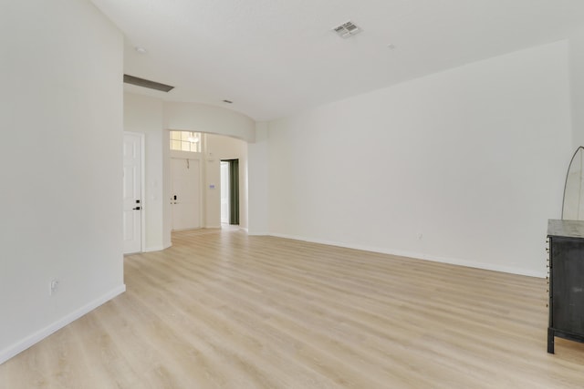 unfurnished living room featuring light wood-type flooring