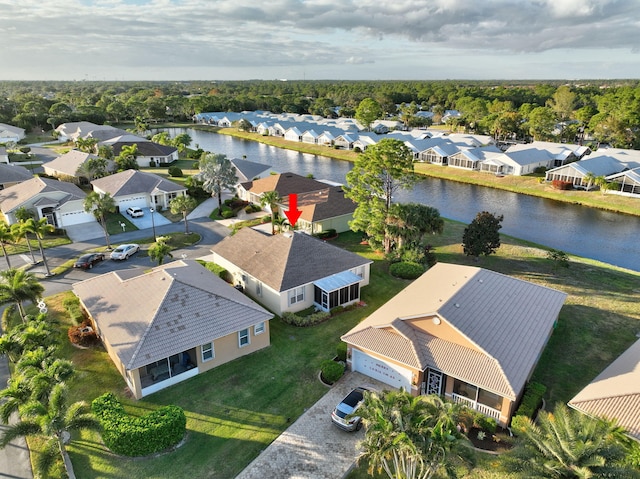 drone / aerial view featuring a water view