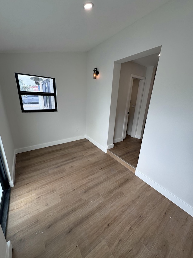 unfurnished room featuring light hardwood / wood-style floors