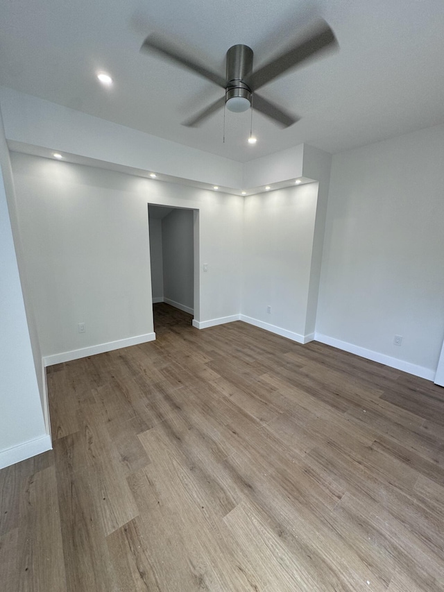 interior space featuring ceiling fan and light wood-type flooring