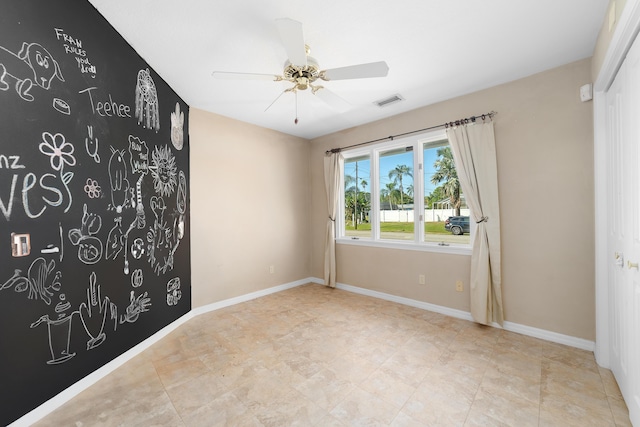 empty room with ceiling fan