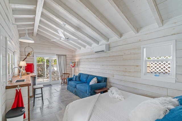 bedroom featuring wood walls, french doors, lofted ceiling with beams, sink, and a wall mounted AC