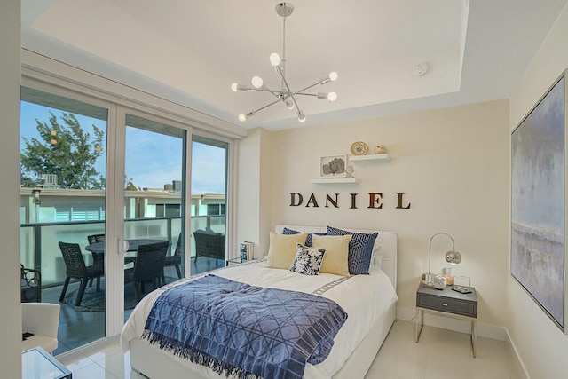 bedroom featuring access to exterior, light tile patterned floors, a tray ceiling, and an inviting chandelier