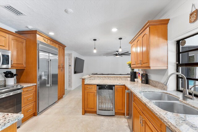 bathroom with tiled shower, tile patterned floors, toilet, tile walls, and vanity