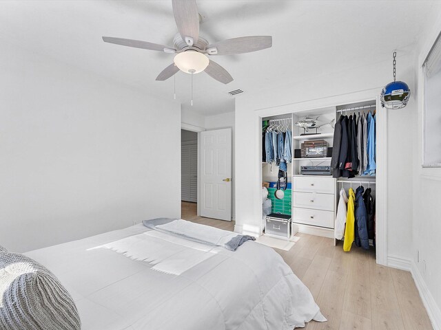 office with ceiling fan and light wood-type flooring