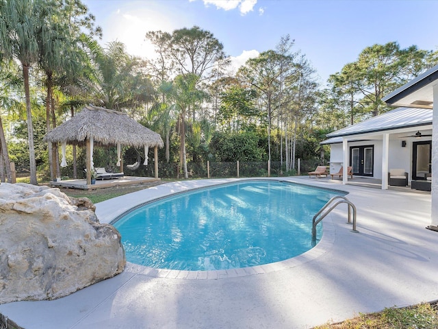 view of pool featuring a gazebo and a patio area