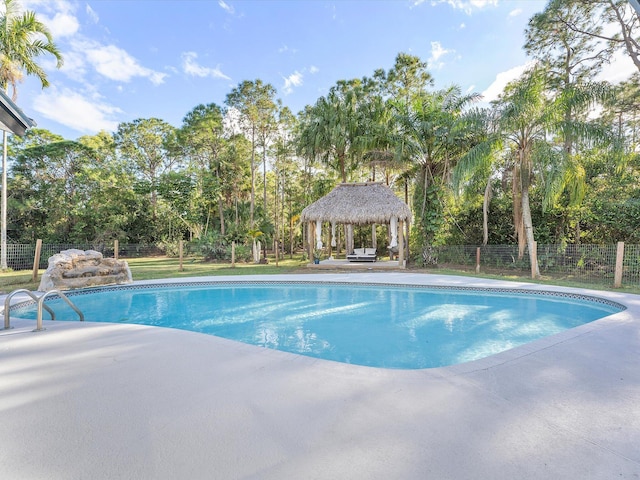 view of pool featuring a gazebo and a patio area