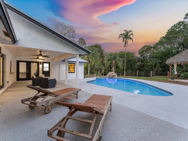 view of swimming pool with a patio area