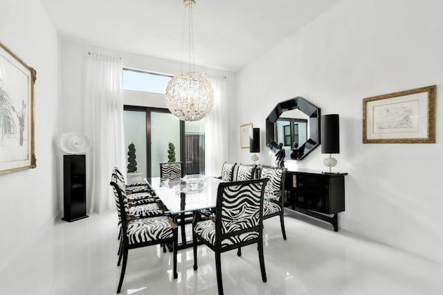 dining room with a chandelier