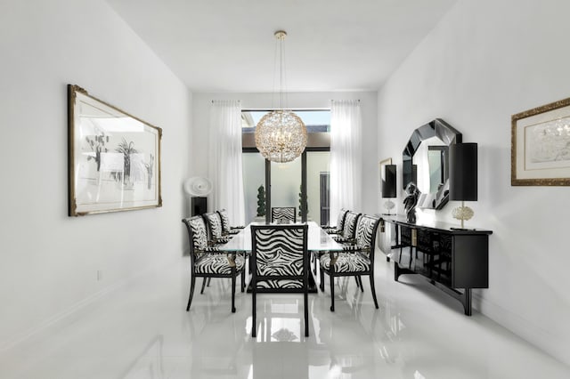 dining space featuring an inviting chandelier