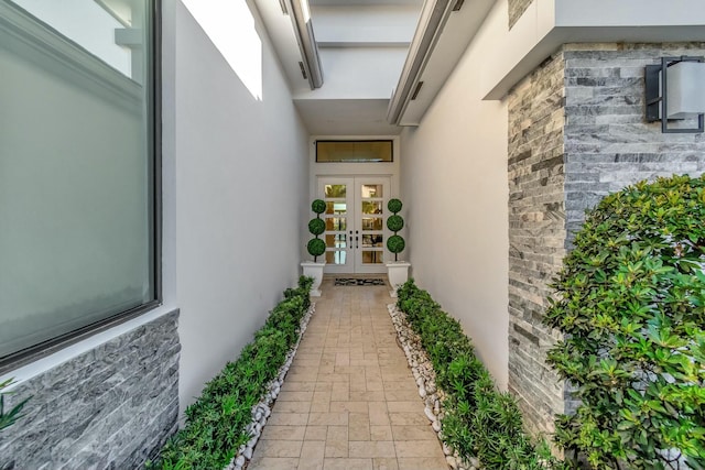 property entrance featuring french doors