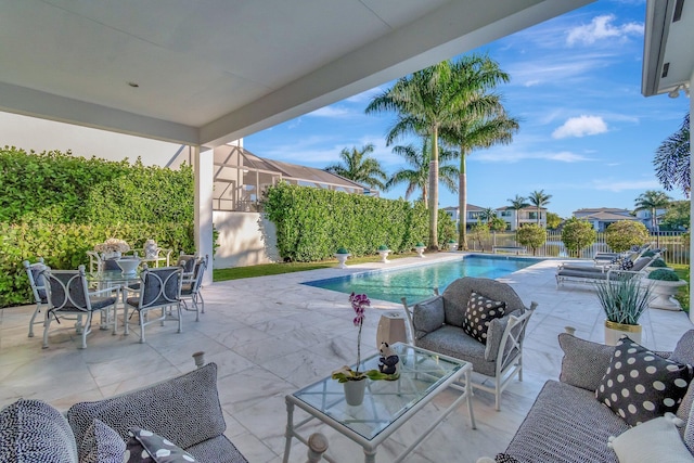 view of swimming pool featuring a patio area and outdoor lounge area