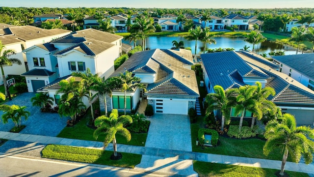 birds eye view of property featuring a water view