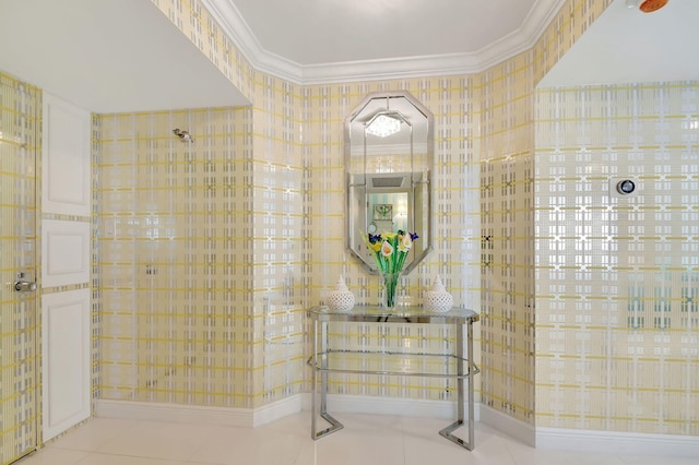 bathroom with crown molding and tile patterned flooring