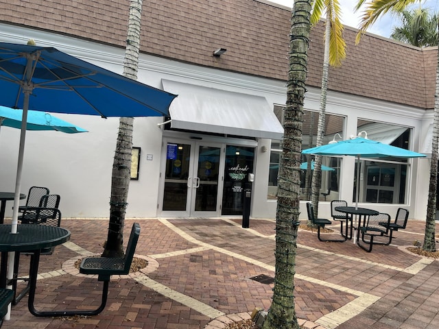 886 Flanders S, Delray Beach, FL 33484 - view of patio / terrace featuring french doors