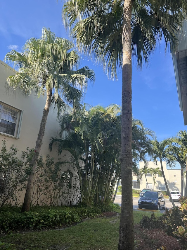 886 Flanders S, Delray Beach, FL 33484 - view of side of home featuring stucco siding