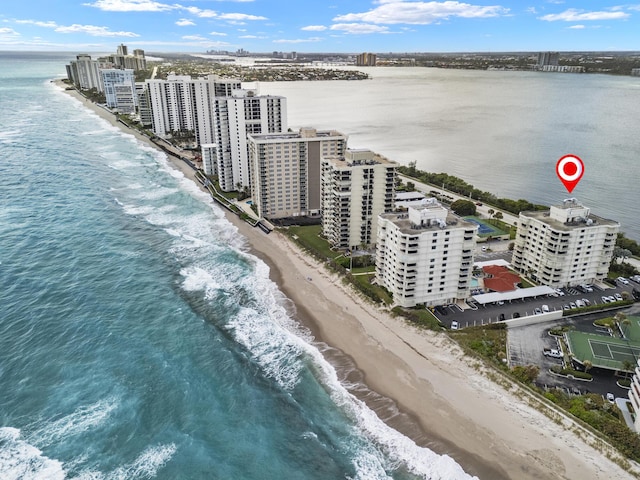 aerial view featuring a water view and a view of the beach