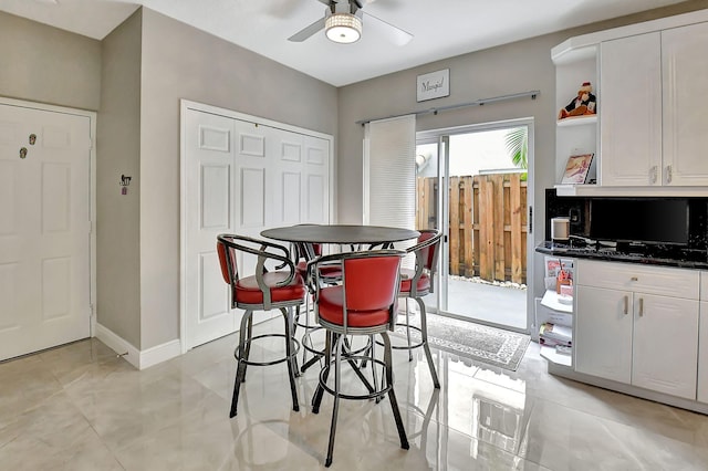 dining space with ceiling fan