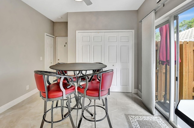 dining area with ceiling fan