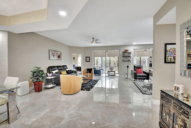 living room featuring ceiling fan