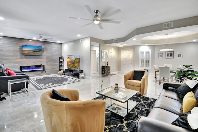 living room featuring ceiling fan