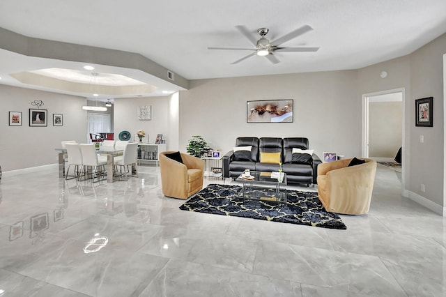 living room with ceiling fan