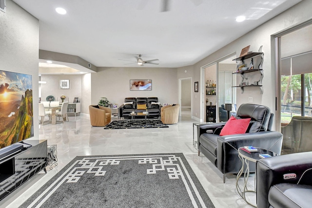 living room featuring ceiling fan