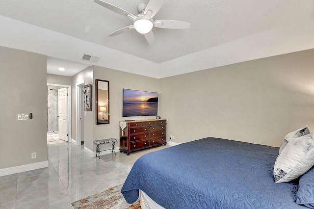 bedroom featuring ceiling fan and ensuite bathroom