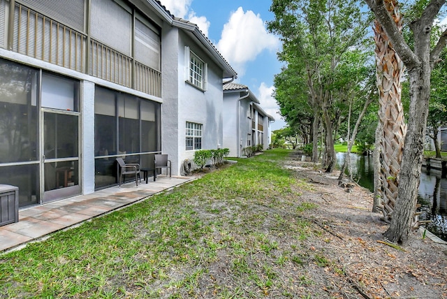 view of yard with a water view