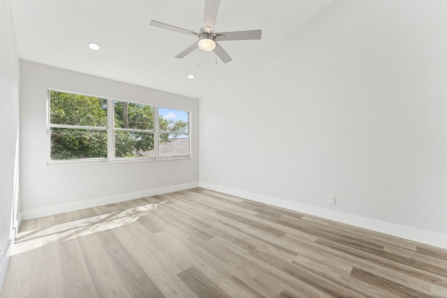 unfurnished room featuring light hardwood / wood-style floors and ceiling fan