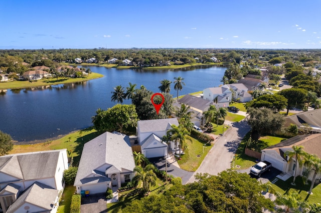 drone / aerial view with a water view