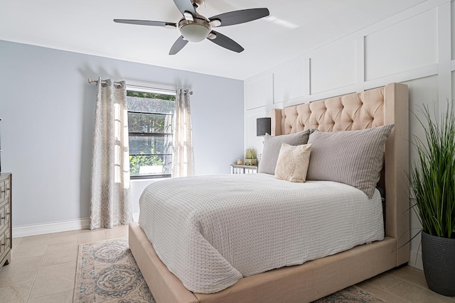 bedroom featuring ceiling fan and light tile patterned floors