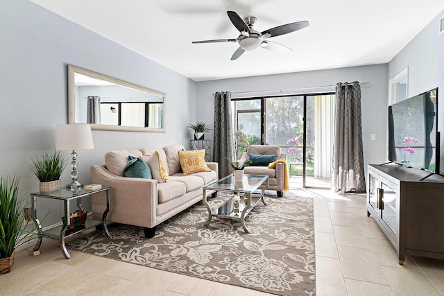 tiled living room featuring ceiling fan