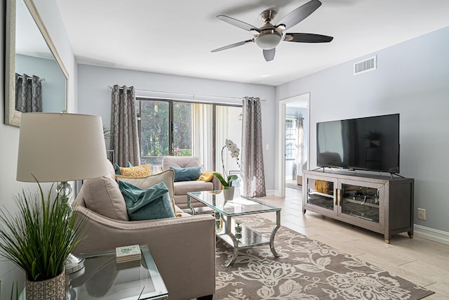 living room featuring ceiling fan