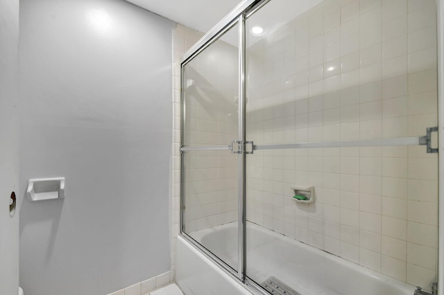 bathroom featuring enclosed tub / shower combo