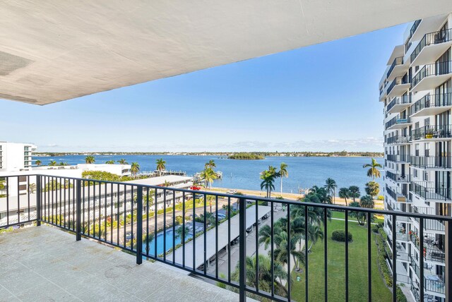 balcony featuring a water view