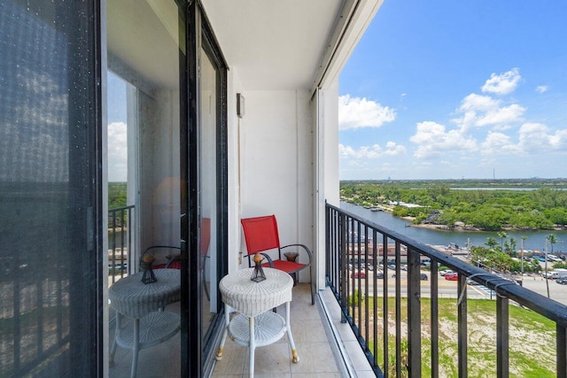 balcony featuring a water view