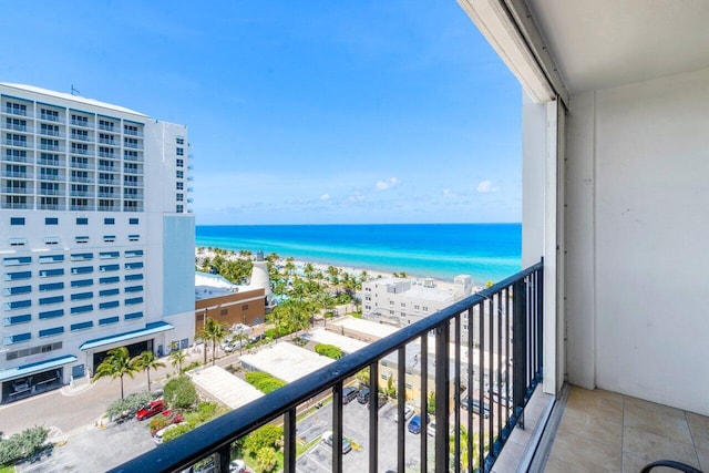 balcony featuring a water view