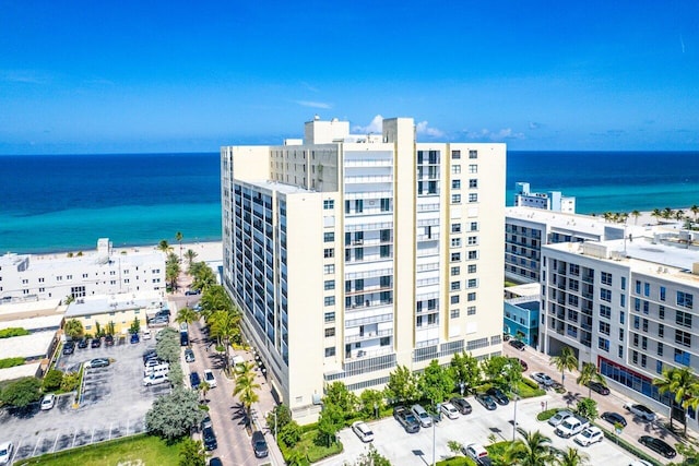 bird's eye view with a view of the beach and a water view