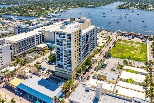 birds eye view of property featuring a water view