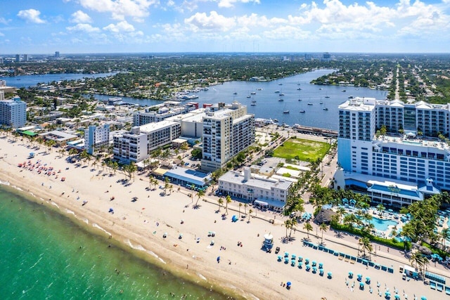 aerial view featuring a water view and a beach view